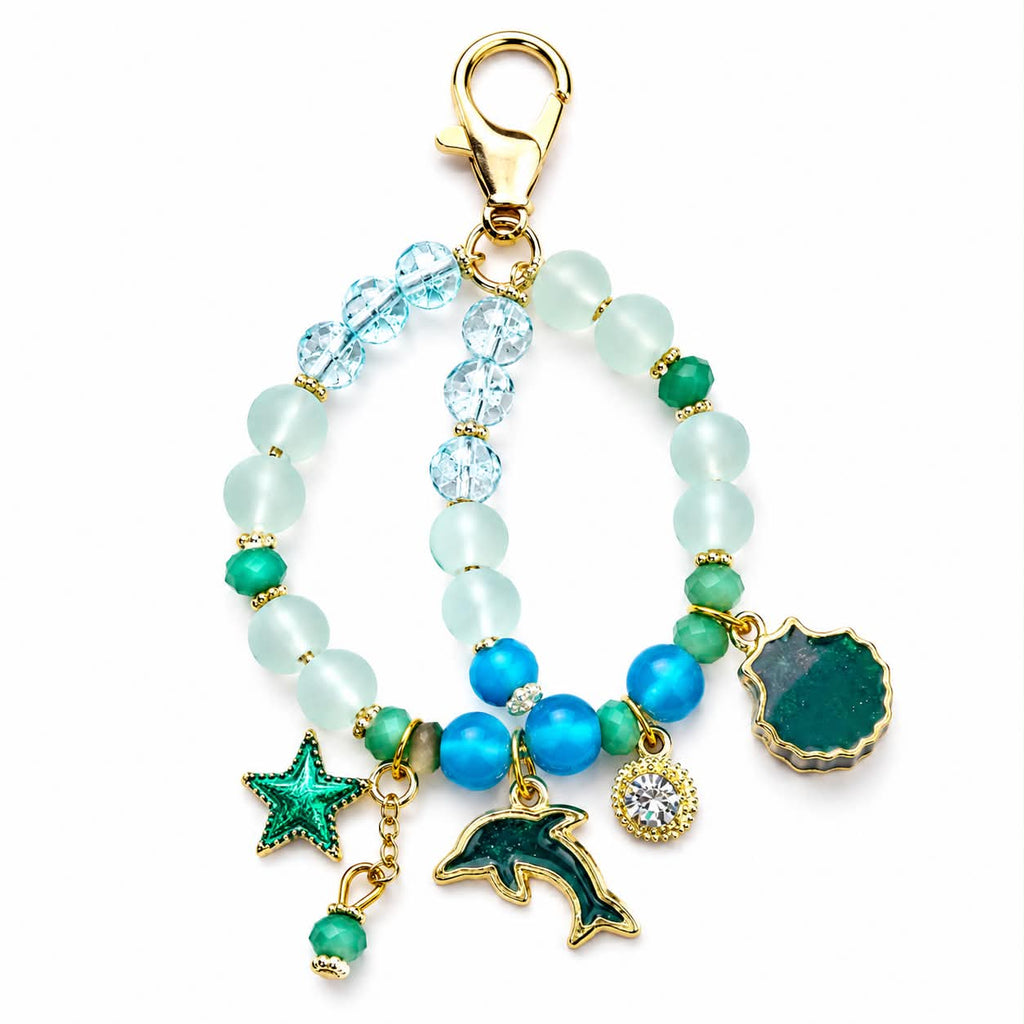 Ocean-Inspired Beaded Bracelet With Dolphin Starfish & Gem Charms Adjustable Gold-Plated Accent Design