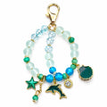 Ocean-Inspired Beaded Bracelet With Dolphin Starfish & Gem Charms Adjustable Gold-Plated Accent Design